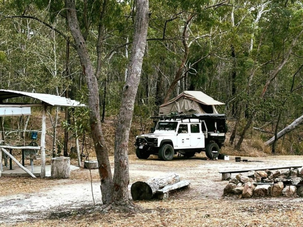 A cozy upgraded campsite in Childers, blending rustic charm with modern comforts for a stress-free outdoor adventure.